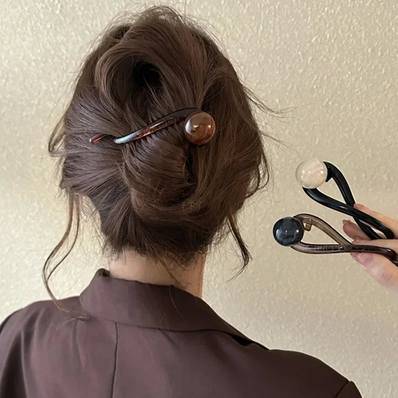Pince chignon torsadée perle