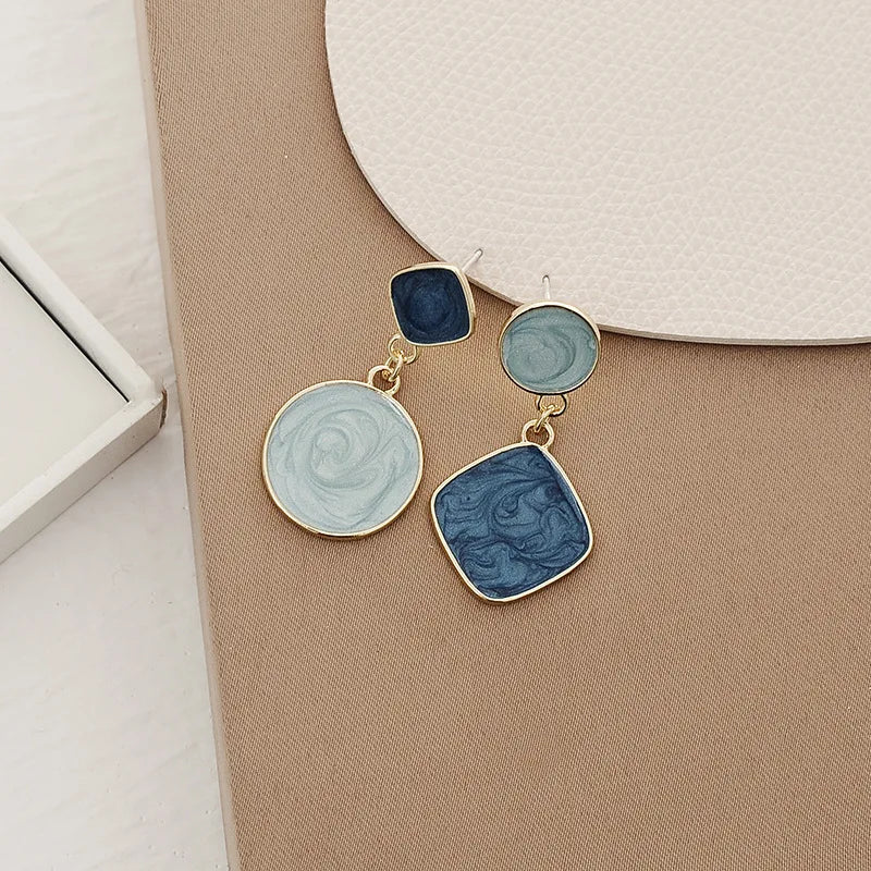 Pendantes émaillées bleues, émail marbré