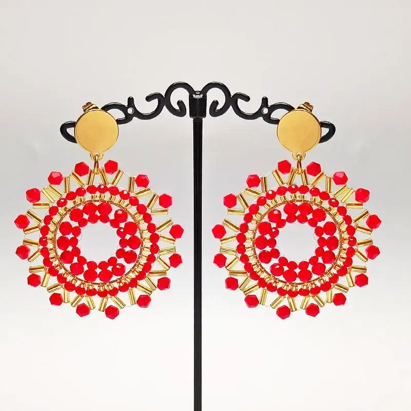 Pendantes soleil en perles rouges