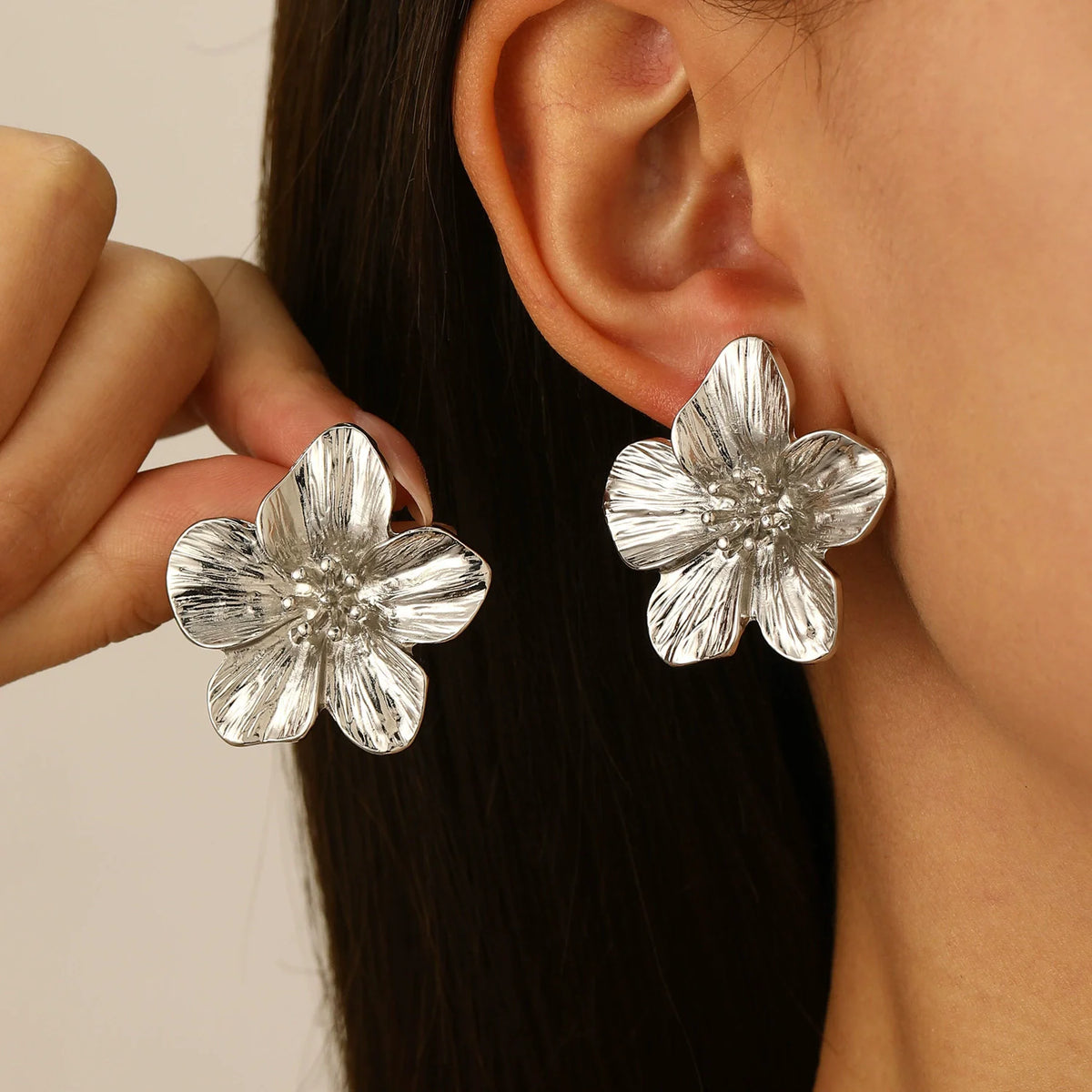 Boucles fleur en métal