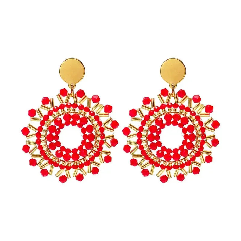 Pendantes soleil en perles rouges