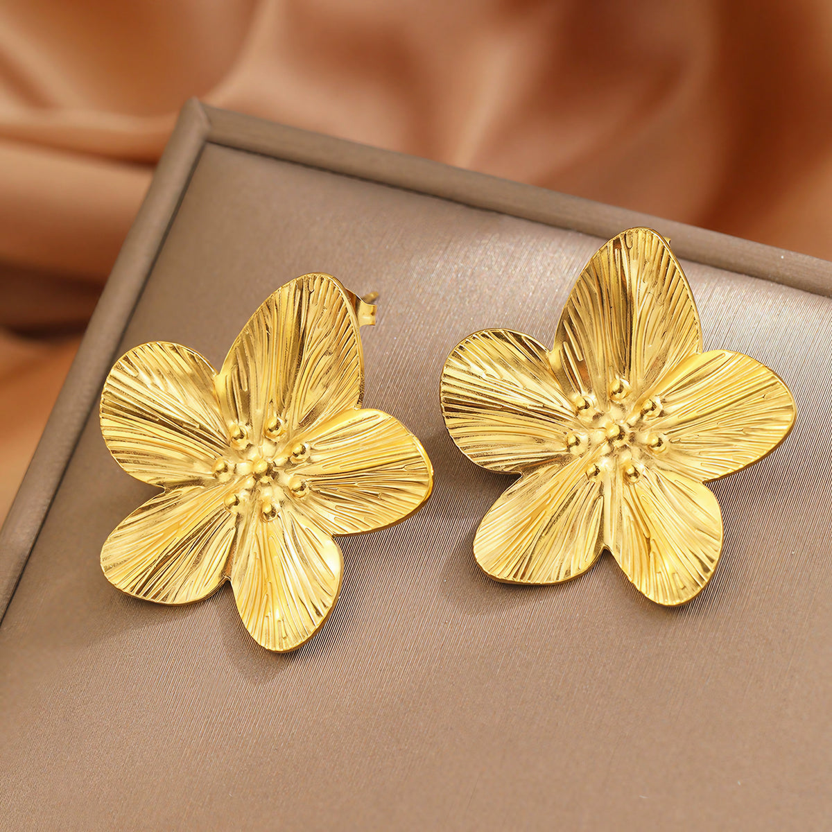Boucles fleur en métal