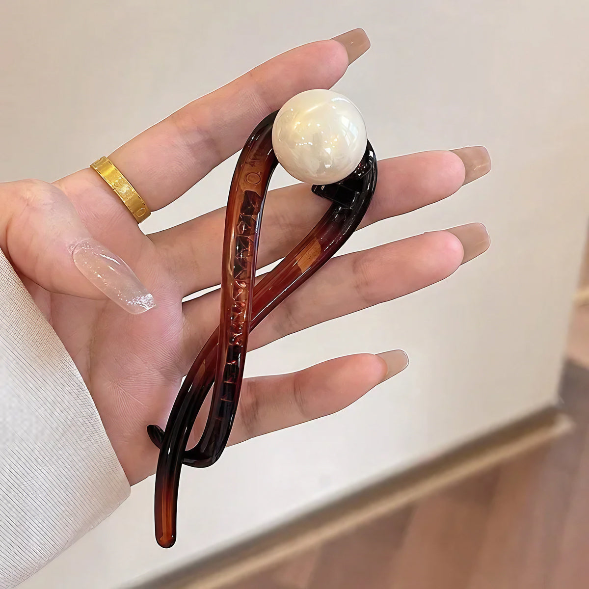 Pince chignon torsadée perle