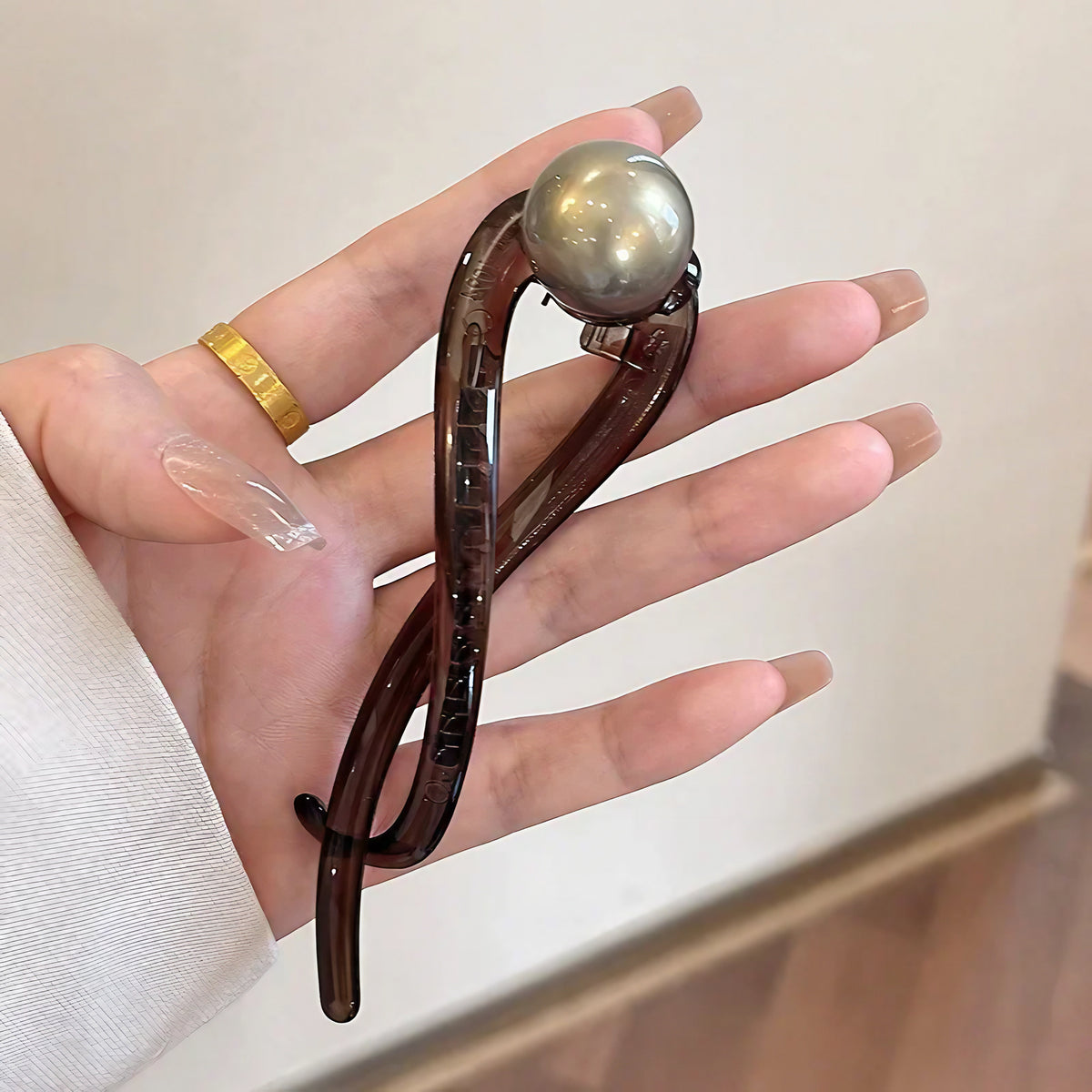 Pince chignon torsadée perle