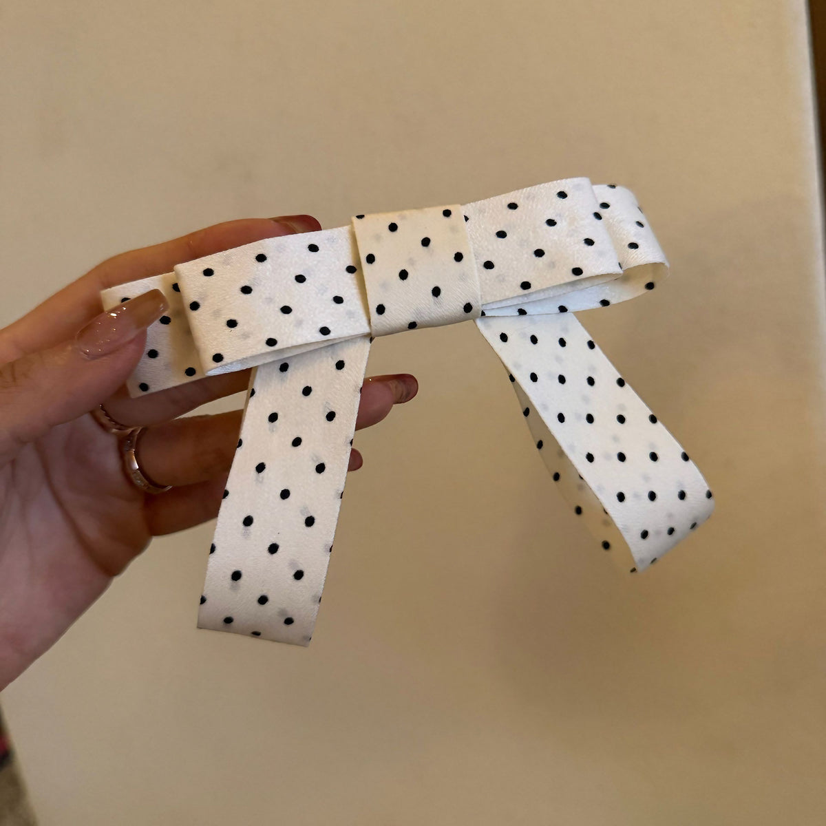 Pince nœud à pois