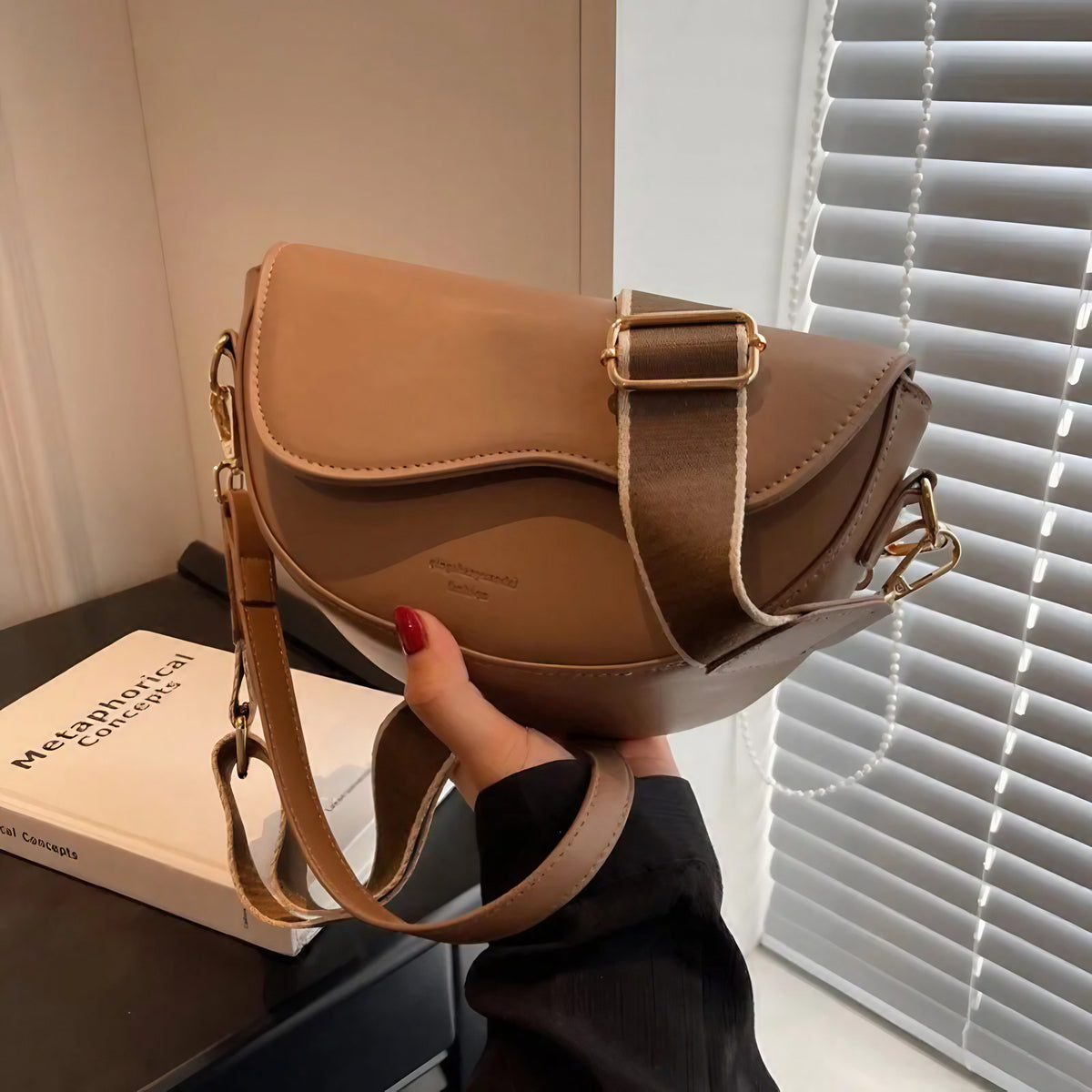 Sac selle à rabat