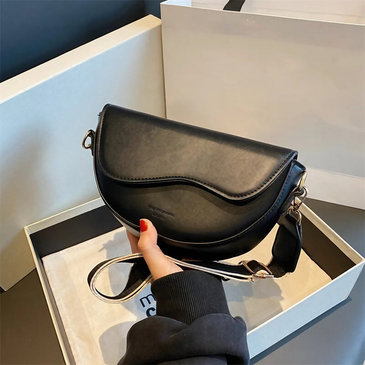 Sac selle à rabat